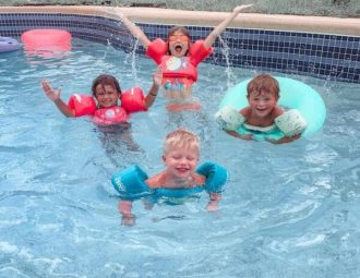 Grandbabies around the pool